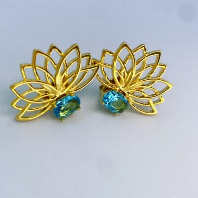Brinco ponto de luz azul banhado a ouro