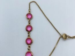 Pulseira com bolas rosas banhado no ouro