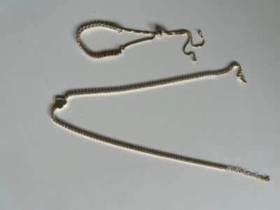 Conjunto colar e pulseira Riviera cravado com zircônia folheado a ouro